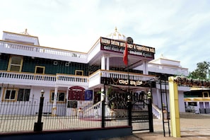 A multi-story building with a sign for 'RADA SHYAM RESIDENCY & CONVENTION HALL'. - Radha Shyam Residency & Convention Hall  (Mysore)