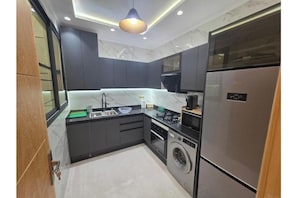 Private kitchen - Host ABDO: Apartment 4 (Larache)
