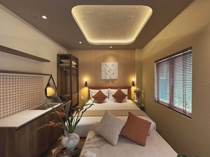 A modern hotel room with a large bed, bedside tables, a built-in wardrobe, a bathroom with a sink, and a window with blinds. - The Mango Stay Thao Dien (An Khanh)