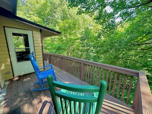 A wooden deck with a railing, a door, and a window. - Pet-Friendly Mountain Retreat, Fire Pit + 2 Decks (Banner Elk)