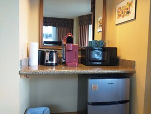 A kitchenette with a coffee maker, microwave, toaster, and a refrigerator. - NEW LISTING - 281 Slopeside King Bed Studio, views, Pet friendly (Crested Butte)