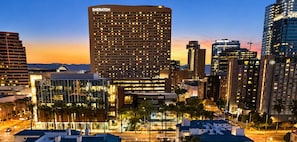 A high-rise hotel with a modern design, multiple floors, and a prominent Sheraton sign. - Downtown Phoenix Retreat - Skyline Views + Pool (Phoenix)