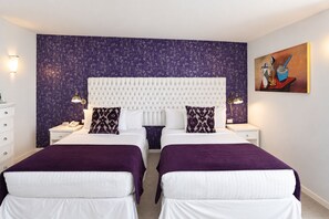 A double room with two beds, a headboard, bedside tables, lamps, a painting, and a dresser. - Mansion Maria - 5 Luxury Suites & Heated Pool (San Felipe del Agua)