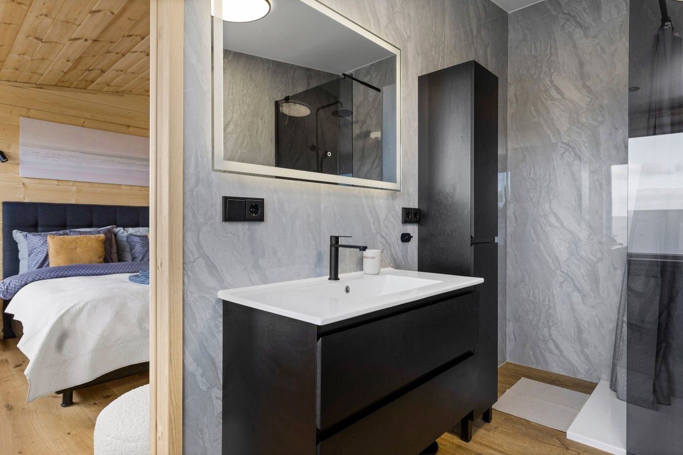 Ensuite vanity with backlit mirror