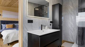 Ensuite vanity with backlit mirror