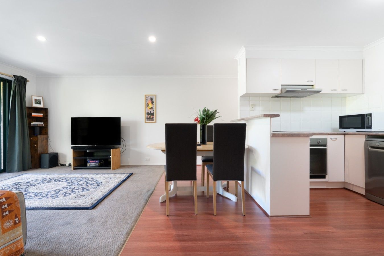 Enjoy the spacious open-plan living and dining area, thoughtfully arranged for relaxing, dining and spending quality time together.