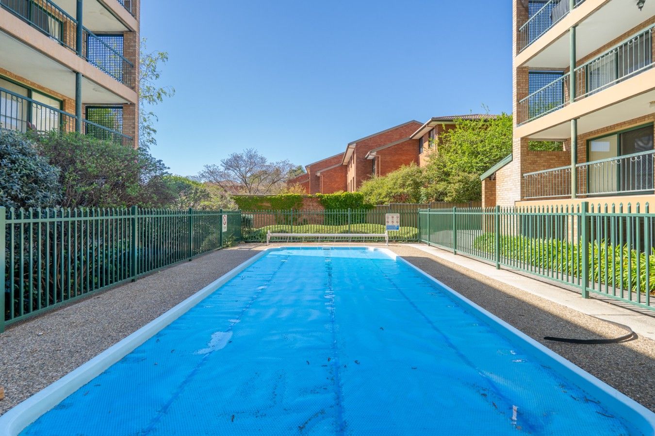 Make the most of sunny days with a refreshing swim in the inviting pool, surrounded by greenery and the stylish property grounds.