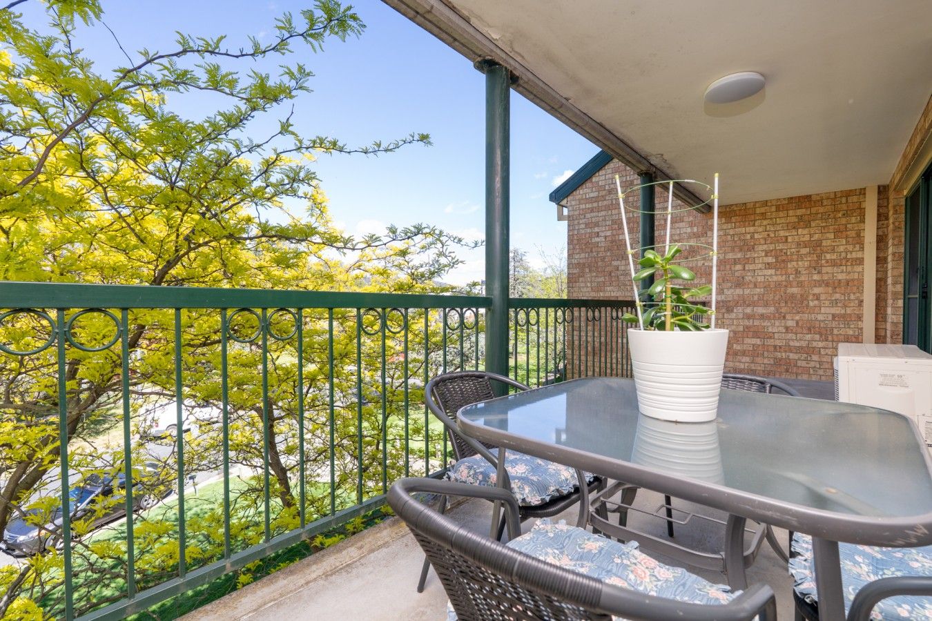 Enjoy your morning coffee or an evening drink on the balcony, with comfortable outdoor seating and lovely leafy views.