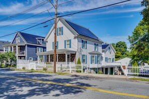A two-story house with a front porch, a garage, and a driveway. - Work, Play & Explore! Saugus Extended Stay (Saugus)