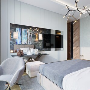 A modern hotel room with a large bed, a desk with a computer and lamp, a chair, and artwork on the wall. - Test Onboarding Property - 13 (Konak)
