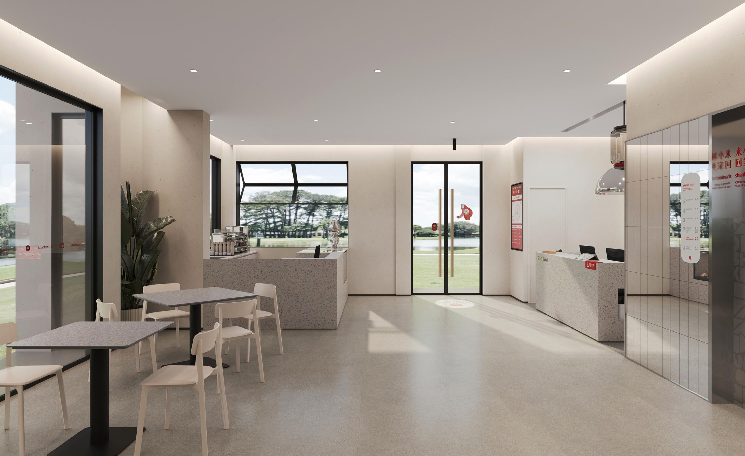 Un interno moderno con una reception, un'area relax e ampie finestre che offrono vista sull'esterno.