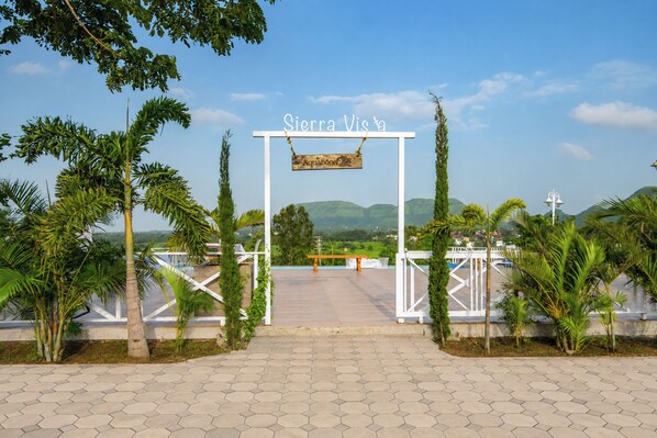 A gated entrance with a sign reading 'Sierra Vis'.