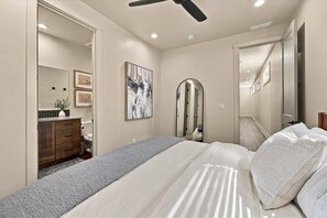 Primary En Suite with King bed, walk-in closet, and walk-in glass surround shower - NEW! Modern Elevated Home & Design | Walk to BSU | Private Lounge Patio with BBQ | Fireplace (Boise)