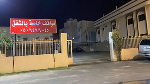 A gated entrance to a building with a sign in Arabic. - REFAD PLUS Ahad rufaidah (Al Khaleej District,Ahad Rafidah)