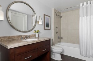 A bathroom with a sink, mirror, toilet, shower, and bathtub. - Ocean View- Amazing 2 Bedroom Villa- Marriott's Oceana Palms- Full Resort Access (Riviera Beach)