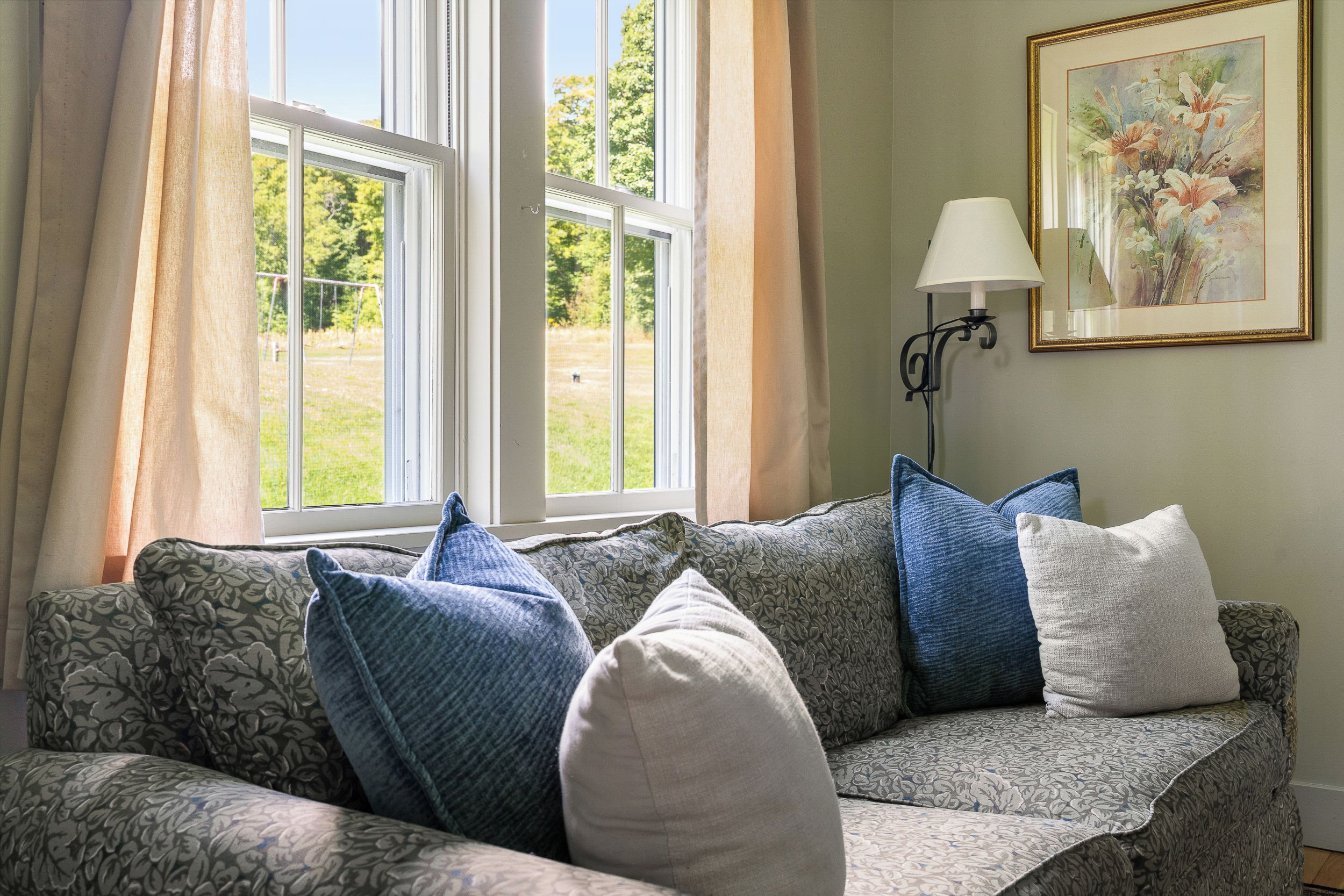 A sunny second sitting area gives your group another cozy spot to read, relax, or enjoy the view.