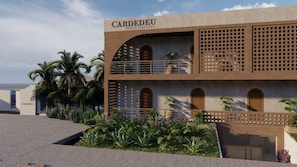A building with the name 'CARDEDEU PUNTA ELEFANTE' on the facade, featuring a modern design with balconies and a flat roof. - Cardedeu Punta Elefante (Chiltiupan)