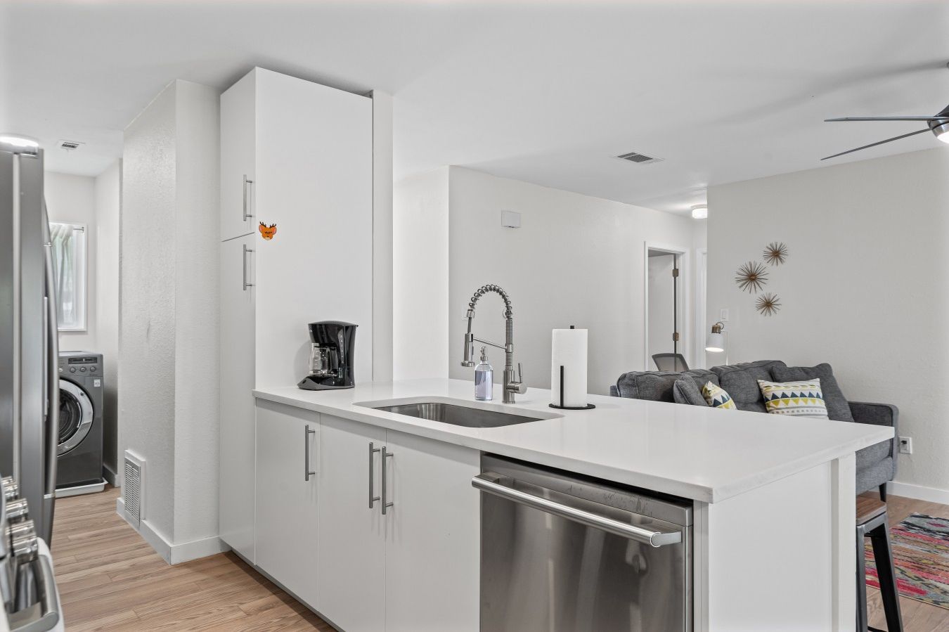 Coffee bar, dishwasher, and full pantry storage make morning routines and cleanup simple.