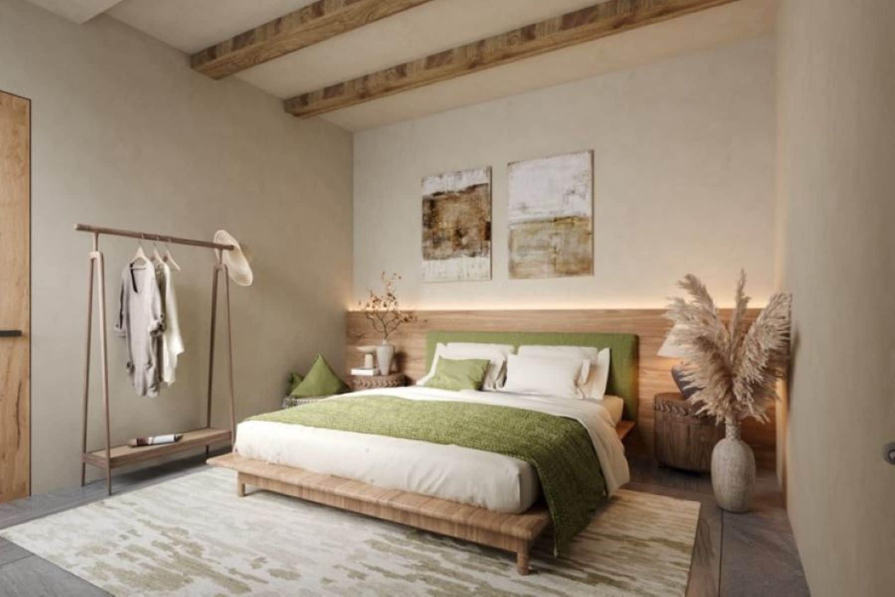 A bedroom with a bed, a wooden headboard, a bedside table, a nightstand, a wall-mounted shelf, and a clothing rack.