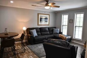 Living area - The Sturgis Place - Custom Built Cabin (Mount Ida)