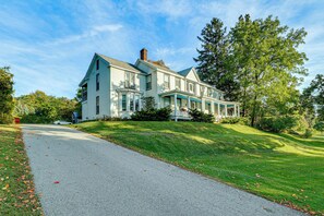 A large, two-story house with a prominent front porch and a driveway leading to the entrance. - Walk to Downtown Shops, Dining! Recreational Trail (Saint Albans City)