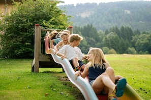 A playground with a slide and climbing structure. - Type 1 - Mailänderhof (Gmünd)