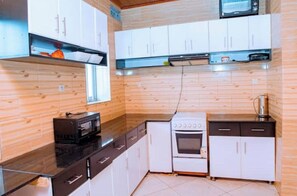 Private kitchen - A Cozy Family Escape Just Minutes from Lake Kivu (Gisenyi)