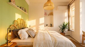 A bedroom with a bed, bedside table, lamp, shelves, and a hanging light fixture. - 3-Storey Private Townhouse with Sauna,Bar,Terrace, 3BR,3BA (Beyoğlu)