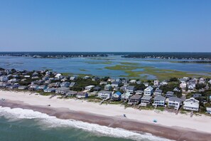 A coastal residential area with houses along the beach and a view of the ocean. - Walk to Beach | Hot Tub | 9BR/5BA | Sleeps 20+ (Surf City)