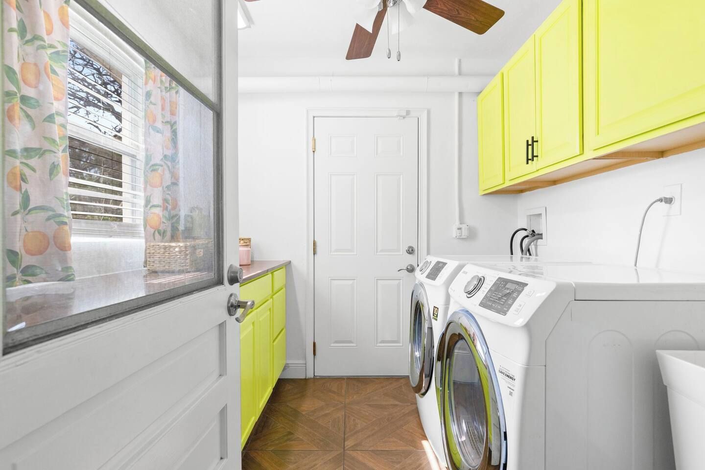 Laundry room with full-size washer and dryer