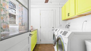 Laundry room with full-size washer and dryer