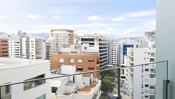 A high-rise urban residential area with multiple apartment buildings, some with balconies.