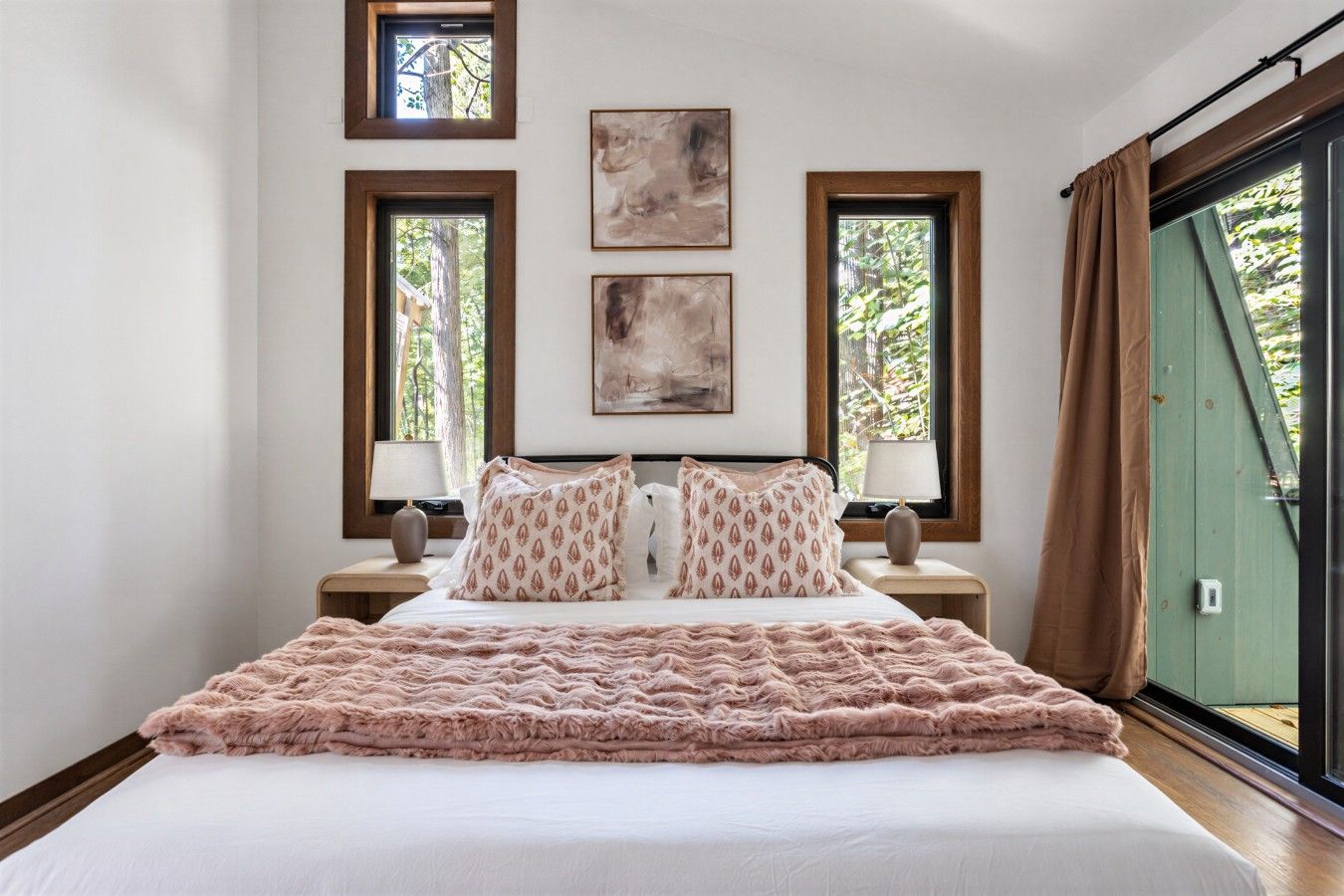 Wake up to peaceful woodland views and step directly onto your own private deck