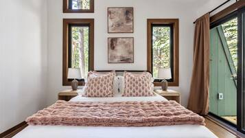 Wake up to peaceful woodland views and step directly onto your own private deck