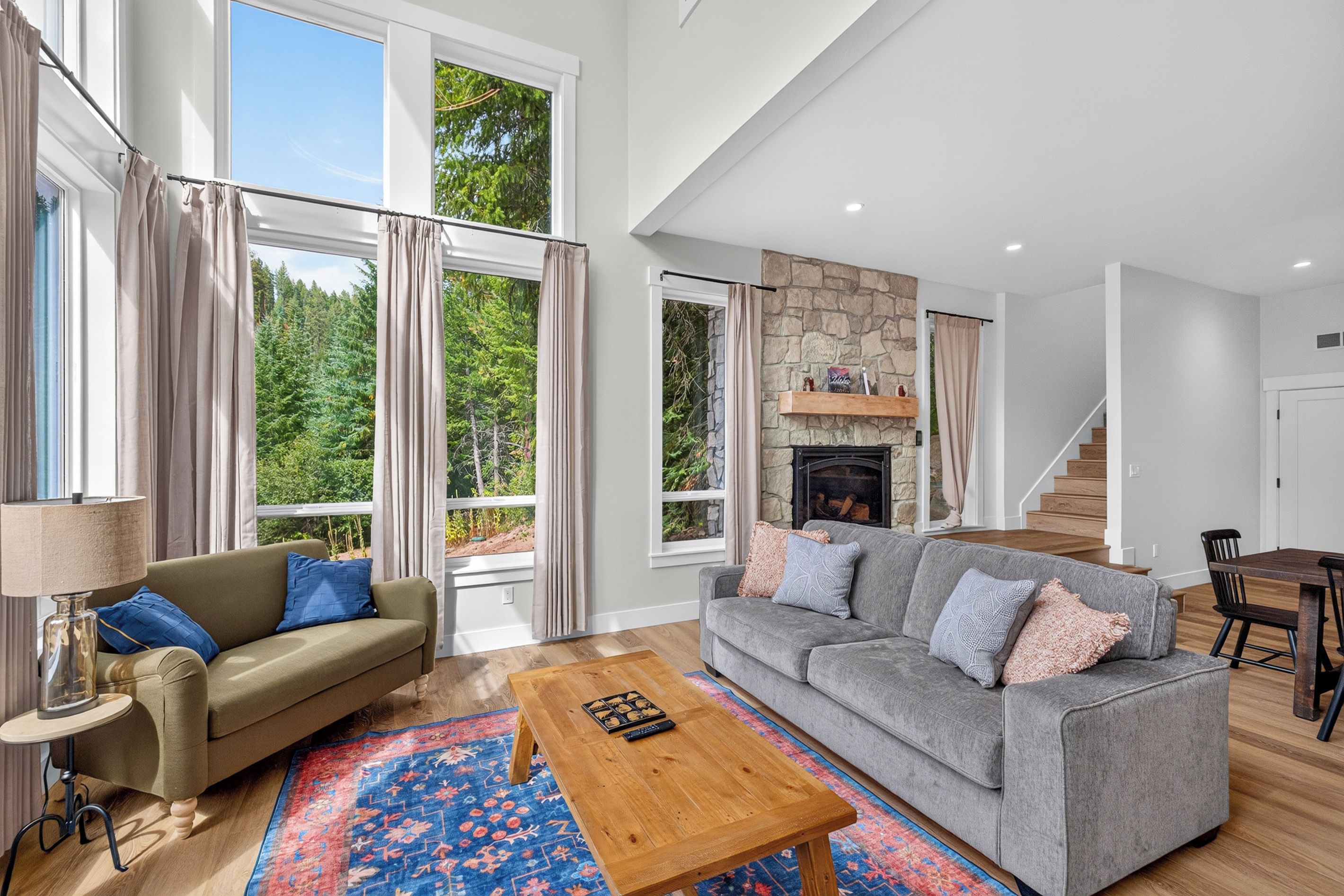 The couch in this open and view-filled room is a sleeper for 2 adults.