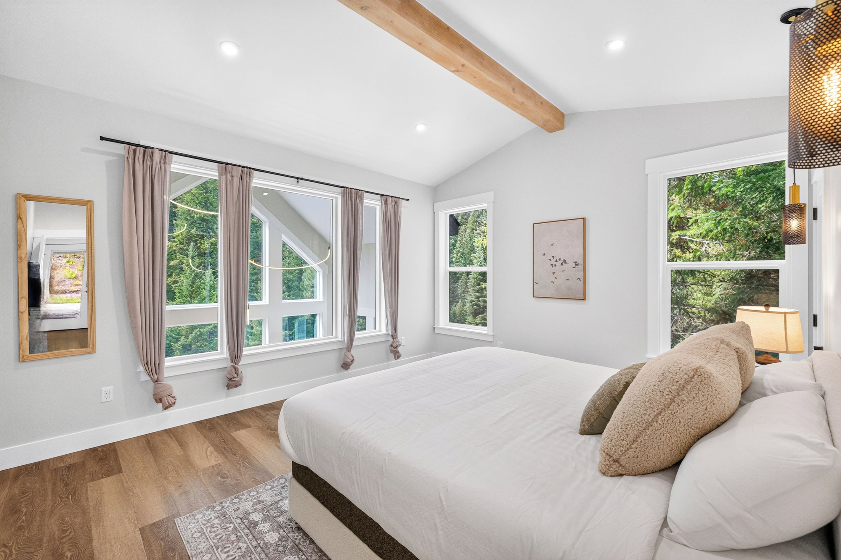 If you can take your eyes off the stunning views from this second story primary suite, you'll sleep like a baby with the hushed sounds of nature all around you.