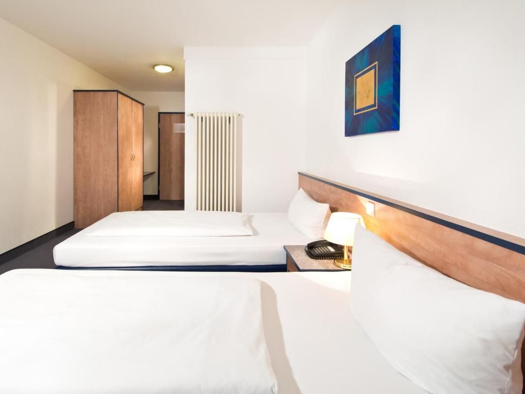 Settle in with ample wardrobe storage and crisp, inviting beds.