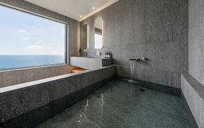 A modern bathroom with a large window, a built-in sink, and a shower area. - Hound Steelcove Gyeongju Gampo (Gyeongju)