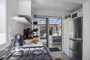 Private kitchen - The Hideaway @ Whanga (Whangamatā)