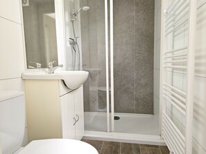 A bathroom with a shower, sink, and toilet. - Cottage in Oostkapelle With Swimming Pool (Oostkapelle)