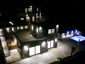 A multi-level stone building with a swimming pool at the rear. - Natural Stone House 6 (Sitia)