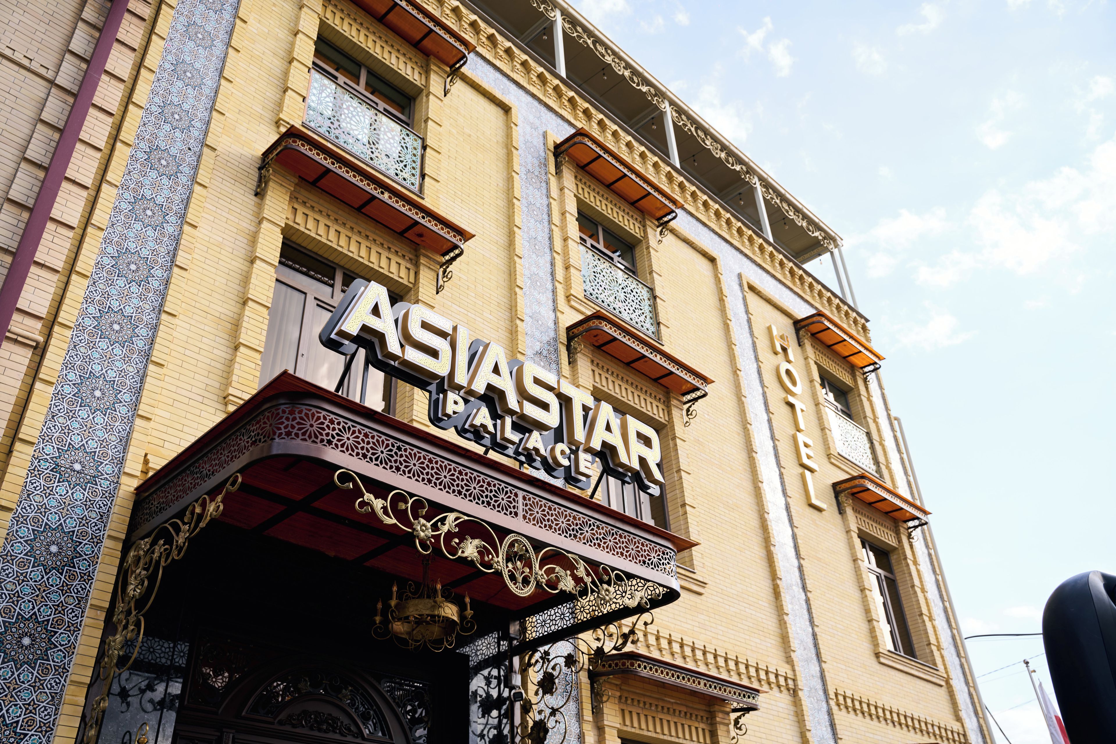 A building with a sign reading 'ASIASTAR HOTEL'.