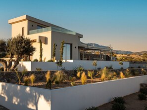 A modern two-story house with a flat roof, large windows, and a white exterior. - Villa in Ierapetra With Swimming Pool (Ierapetra)