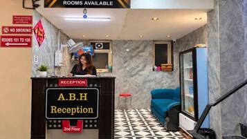A hotel reception area with a reception desk labeled 'A.B.H Reception' on the 2nd floor.