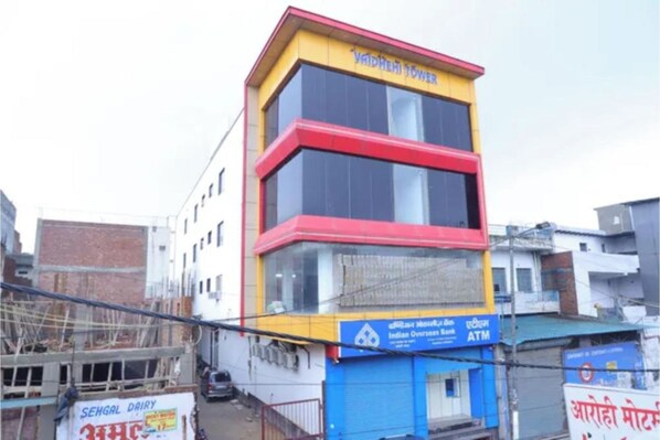 A multi-story building with a sign for 'Vaidhehi Tower'. - FabHotel Grand Stay (New Delhi)