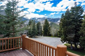 A wooden deck with a view of a mountainous landscape. - Ski right out of the back door to a private trail on Deer Valley Resort! (Deer Valley)