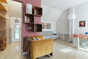 Living area - A cozy and bright 35 square-meter apartment, ideal for two people, located on the fifth floor of a building (elevator up to the third floor and is accessible only after a few steps; NOT suitable for people with disabilities) in a quiet, well-connected re (Milan)