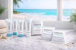 A collection of GIBSON toiletries on a marble surface with a beach view. - New to Program | Santa Rosa Sunshine | 3BR Retreat with Pool, Lake (Santa Rosa Beach)