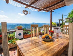 Outdoor dining - Casa Jazmines Sea View Terrace, Jacuzzi, BBQ (Benamargosa)