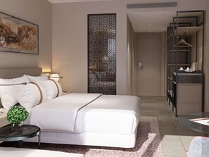 A modern hotel room with a large bed, bedside table, and a decorative wall panel. - Crown Plaza Resort Petra (Wadi Musa)